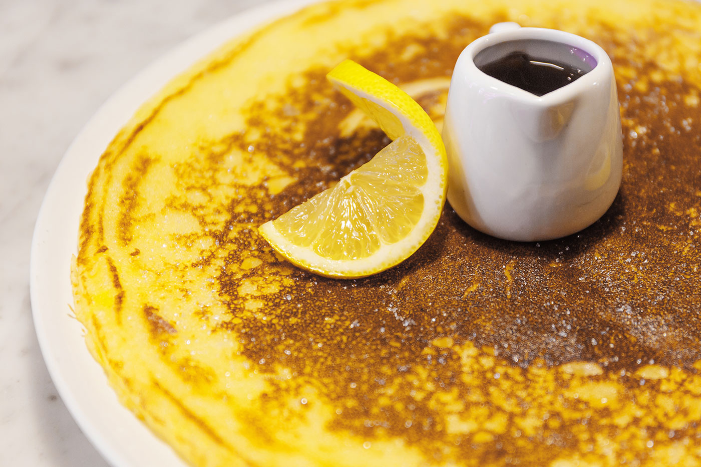 Drizzle delicious toppings such as honey, cinnamon jam, lemon curd and toffee sauce for a sweet tooth.